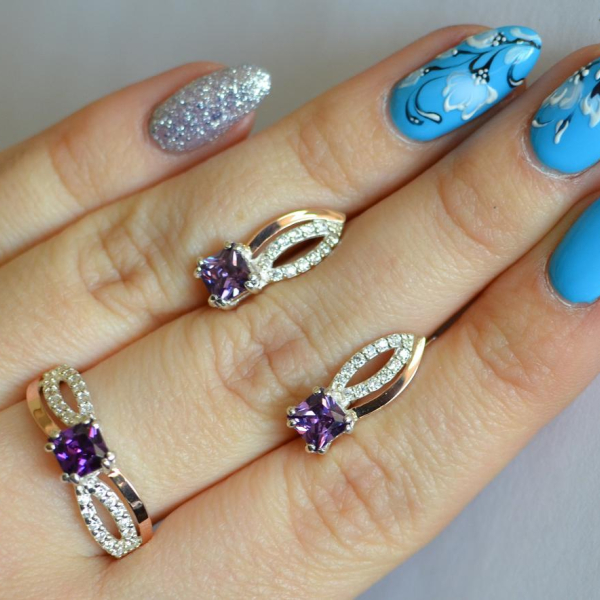 Срібний набір з золотими вставками