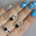 Срібний набір з золотими вставками