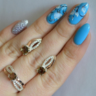 Срібний набір з золотими вставками