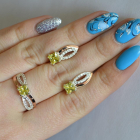 Срібний набір з золотими вставками