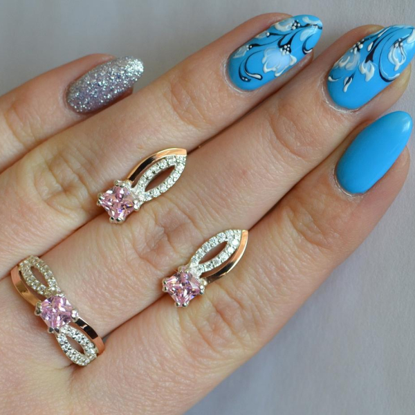 Срібний набір з золотими вставками