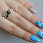 Срібна каблучка з золотими вставками