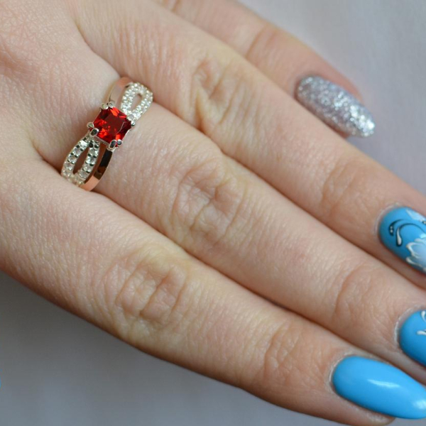 Срібна каблучка з золотими вставками