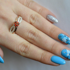 Срібна каблучка з золотими вставками