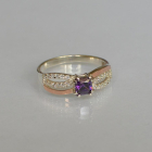 Срібна каблучка з золотими вставками