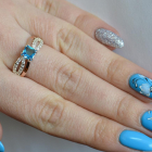 Срібна каблучка з золотими вставками