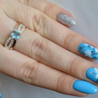 Срібна каблучка з золотими вставками