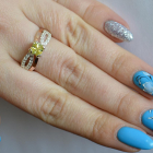 Срібна каблучка з золотими вставками