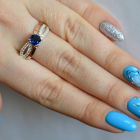 Срібна каблучка з золотими вставками