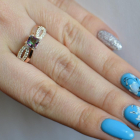 Срібна каблучка з золотими вставками