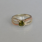 Срібна каблучка з золотими вставками