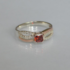 Срібна каблучка з золотими вставками