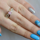 Срібна каблучка з золотими вставками