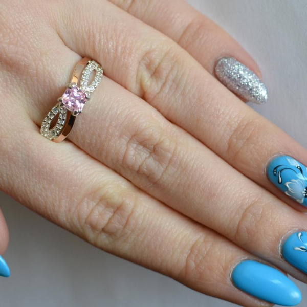 Срібна каблучка з золотими вставками