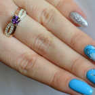 Срібна каблучка з золотими вставками