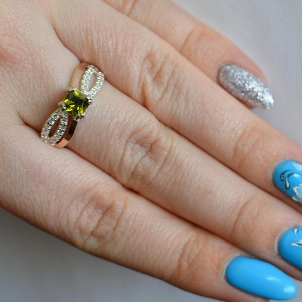 Срібна каблучка з золотими вставками