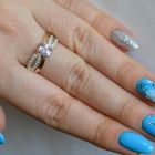 Срібна каблучка з золотими вставками