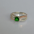 Срібна каблучка з золотими вставками