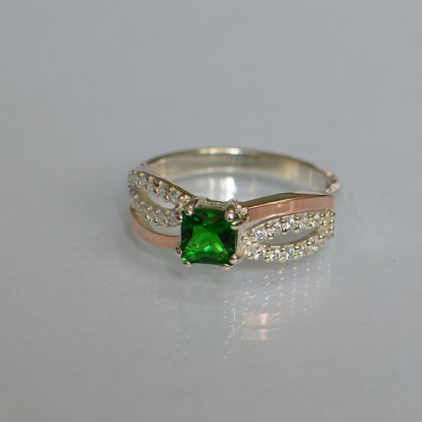 Срібна каблучка з золотими вставками