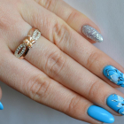 Срібна каблучка з золотими вставками