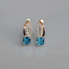 Срібні сережки з золотими вставками