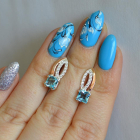 Срібні сережки з золотими вставками