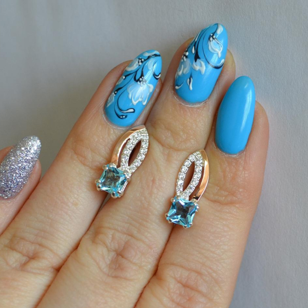 Срібні сережки з золотими вставками