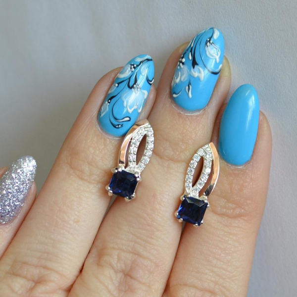 Срібні сережки з золотими вставками