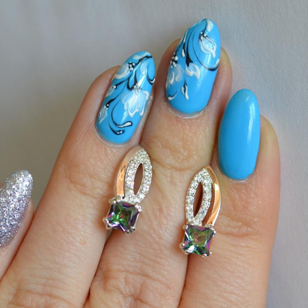 Срібні сережки з золотими вставками