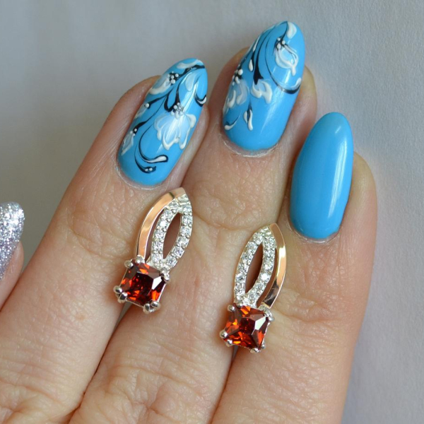 Срібні сережки з золотими вставками