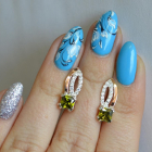 Срібні сережки з золотими вставками