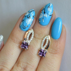 Срібні сережки з золотими вставками