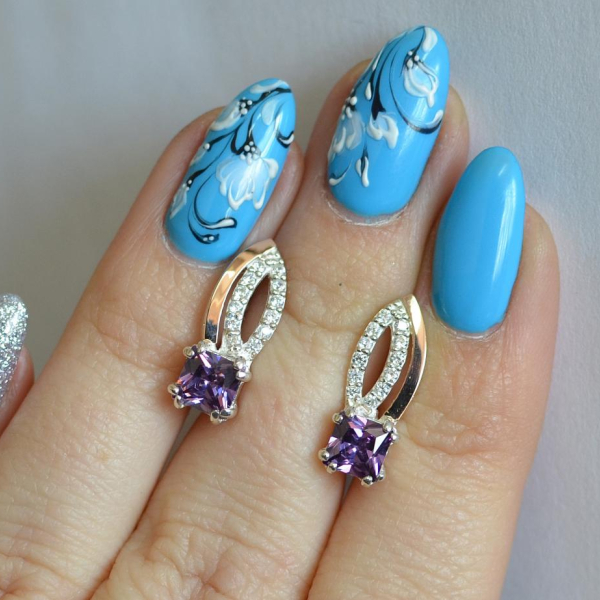 Срібні сережки з золотими вставками