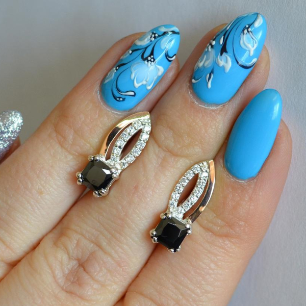 Срібні сережки з золотими вставками