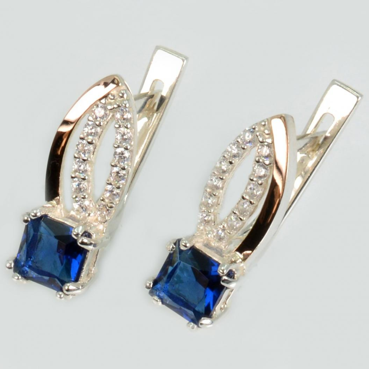 Срібні сережки з золотими вставками