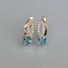 Срібні сережки з золотими вставками