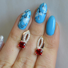 Срібні сережки з золотими вставками