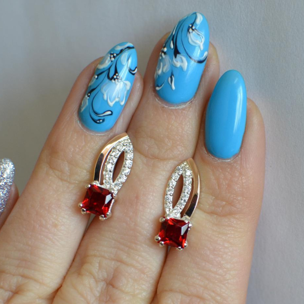 Срібні сережки з золотими вставками