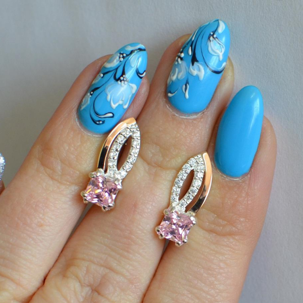 Срібні сережки з золотими вставками