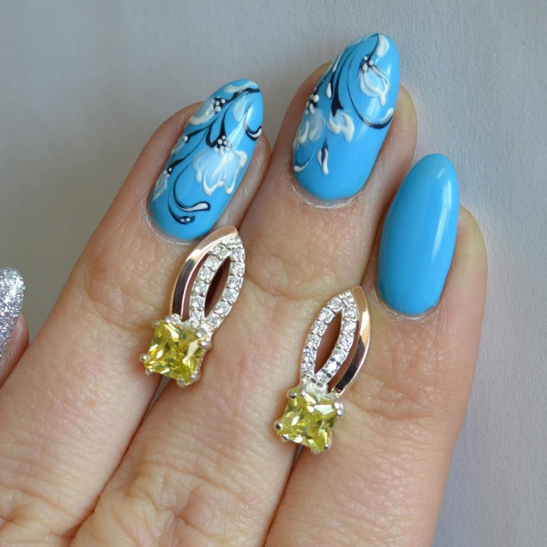 Срібні сережки з золотими вставками