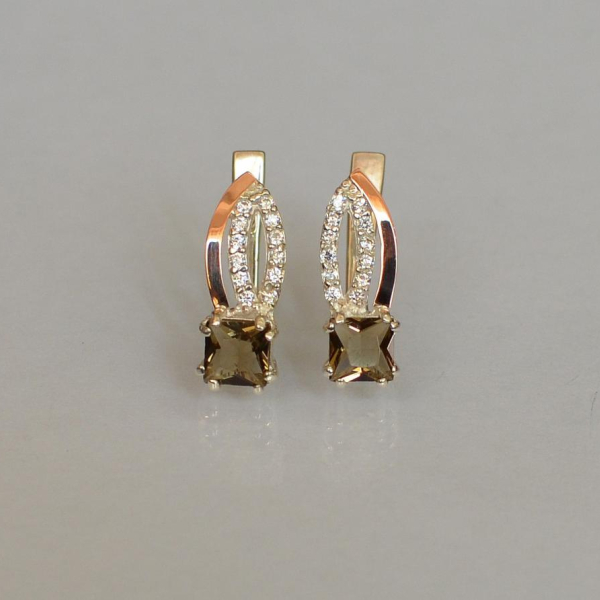 Срібні сережки з золотими вставками