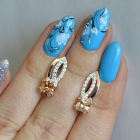 Срібні сережки з золотими вставками