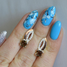 Срібні сережки з золотими вставками