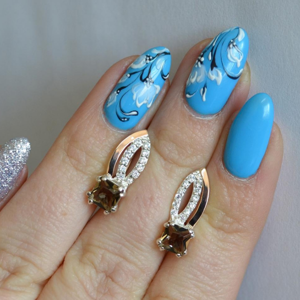 Срібні сережки з золотими вставками