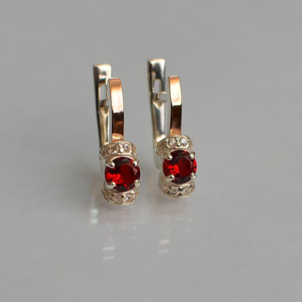 Срібні сережки з золотом