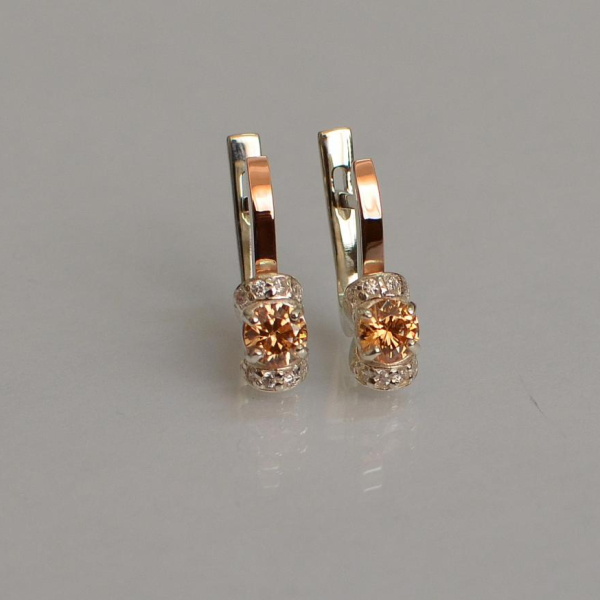 Срібні сережки з золотом