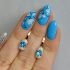 Срібні сережки з золотом