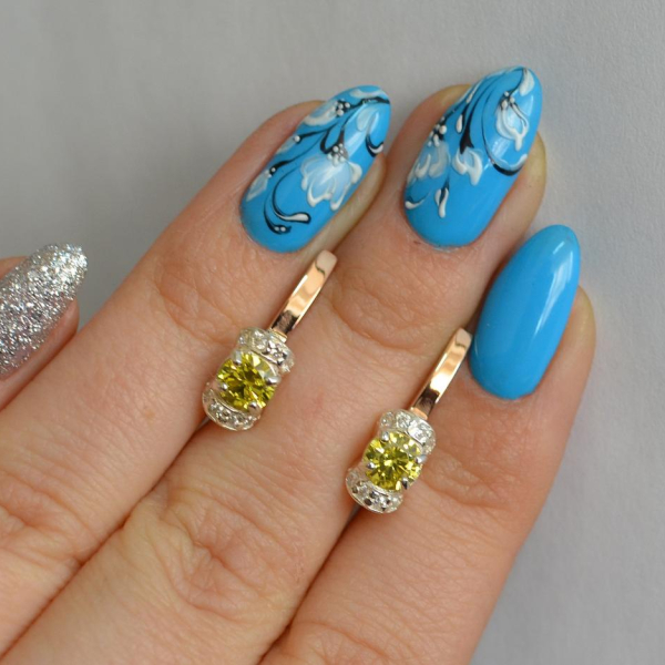 Срібні сережки з золотом