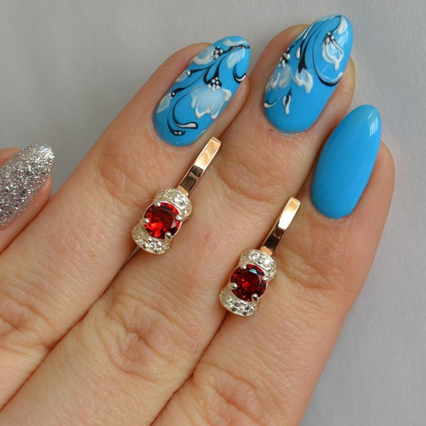 Срібні сережки з золотом