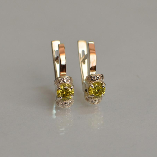 Срібні сережки з золотом